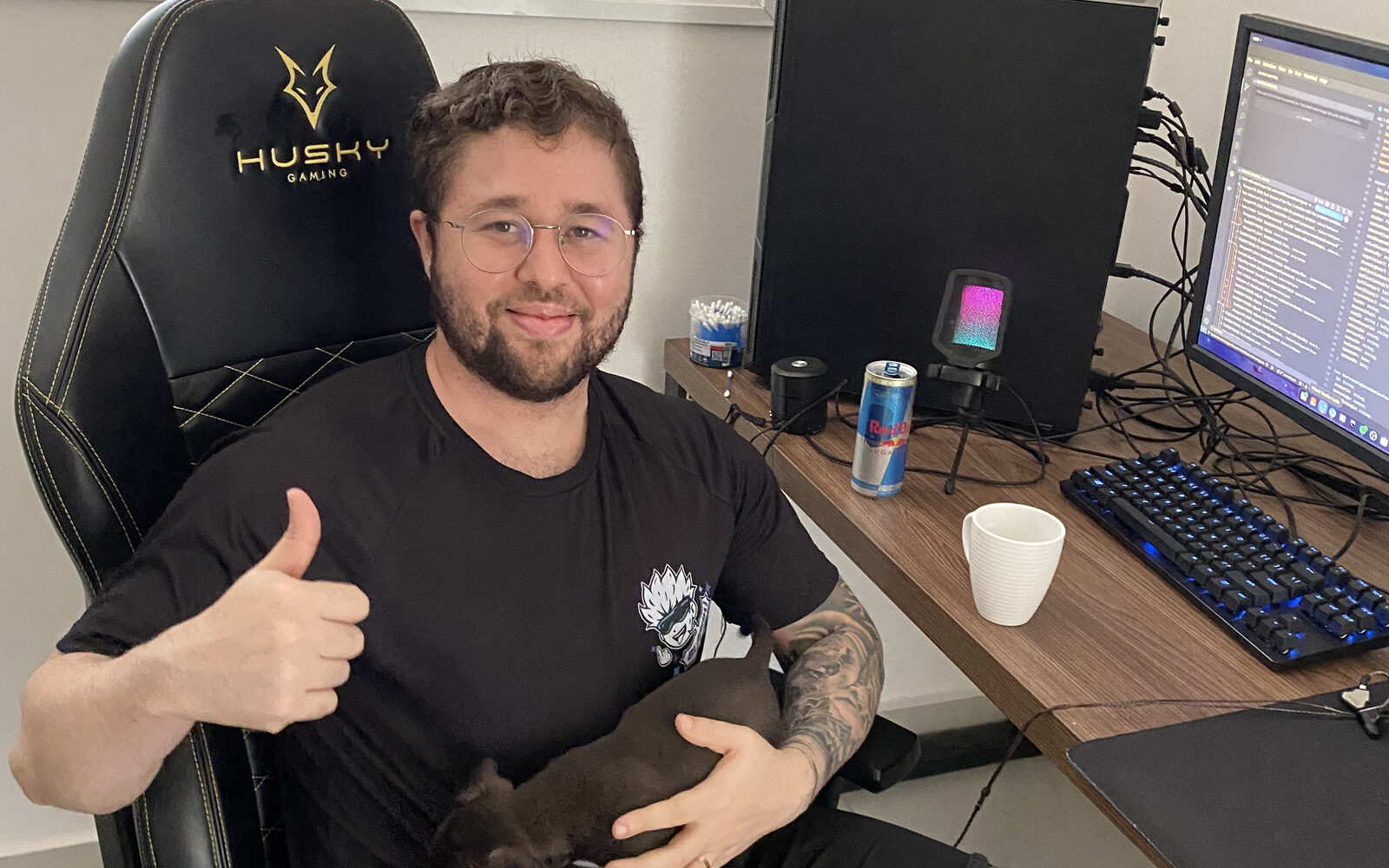 Bruce today, at his work setup, with his dog on his lap.